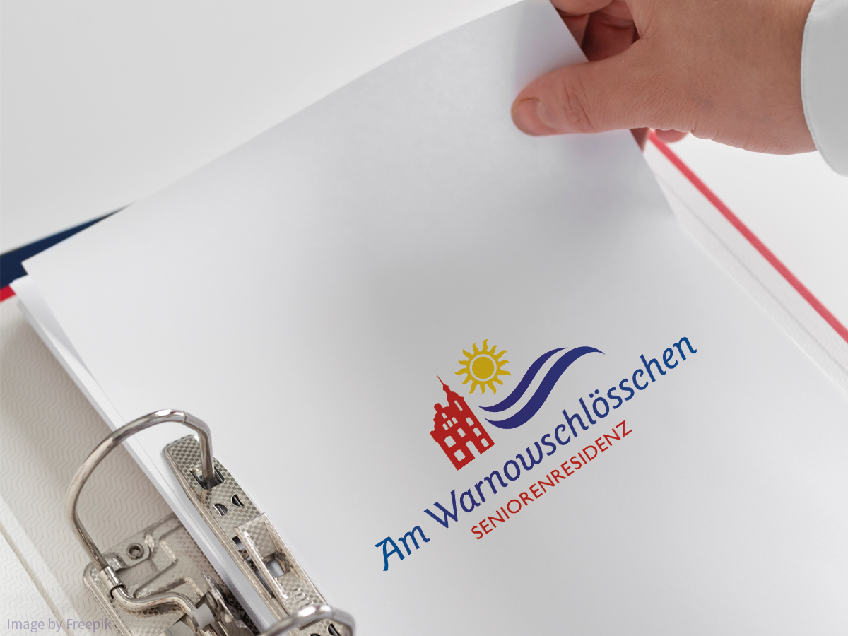 Geöffneter Ordner mit weißem Blatt Papier & dem Logo der Seniorenresidenz